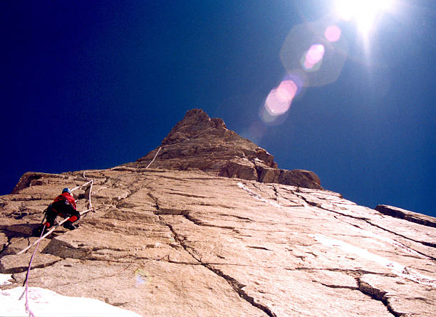 Vertical climbing stock photo