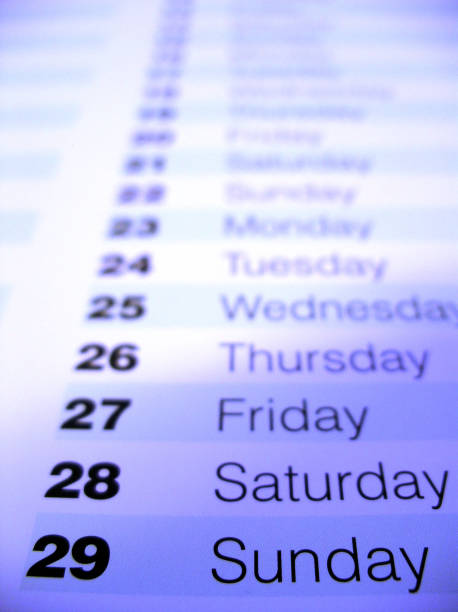 Seven days of the week writing on whiteboard. Close-up.