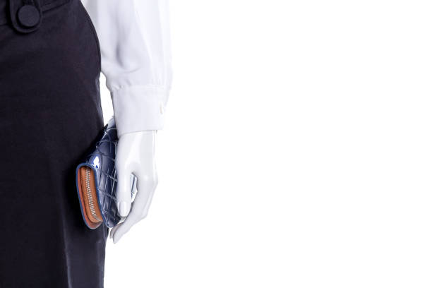 istock Female mannequin in classic apparel, cropped image. 958573412