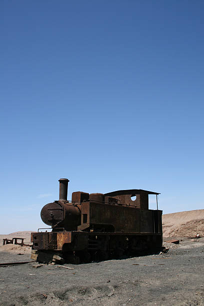 Old rusty locomotive in the desert stock photo