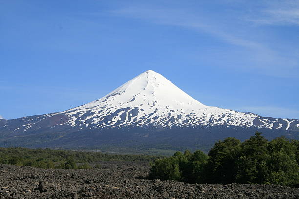 Volcan Llaina and lava fields in Chile stock photo