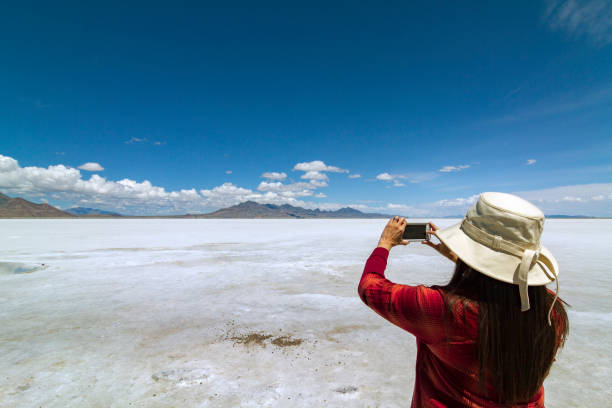 istock Woman Taking Cell Phone Pictures 958588526