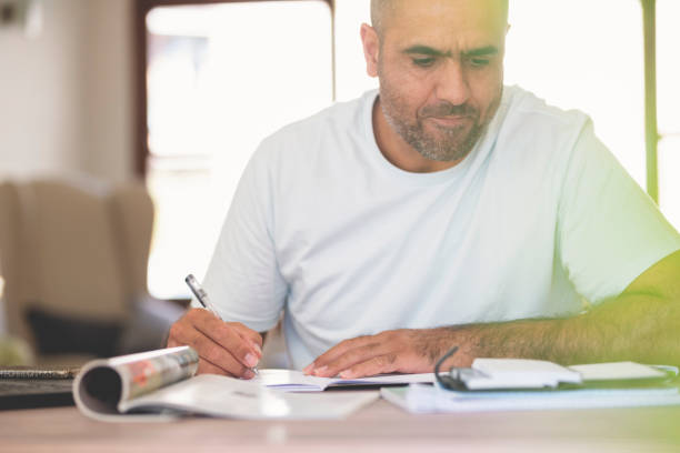 istock Mature mean working at home. 958596822