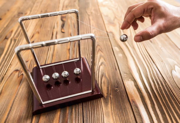 istock Concept For Action and Reaction in Business With Newton's Cradle 958603930