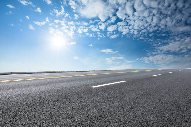 istock new asphalt road and sky clouds 958604334