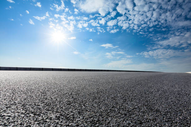 istock new asphalt road and sky clouds 958607034