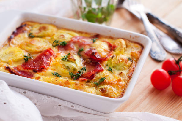 istock Casserole with sweet potatoes, brussel sprouts, bacon 958607990