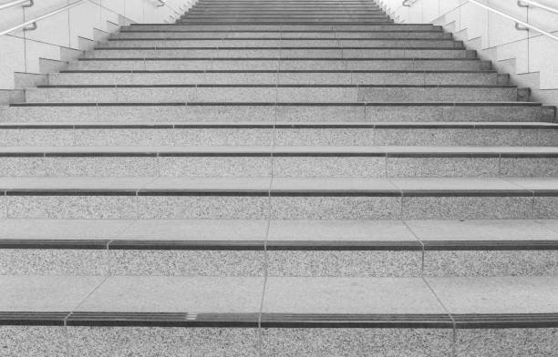 istock Concrete staircase with metallic handrail at modern buiding 958608950