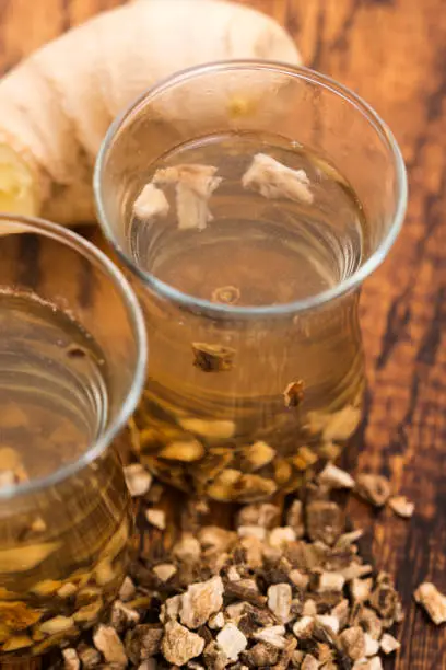 Teaglass with yellowhead root tea