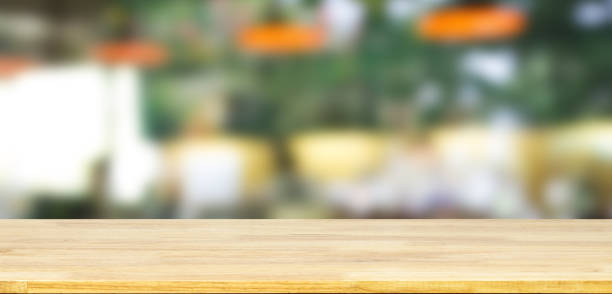 istock Wood shelf on blurred coffee shop 958622916