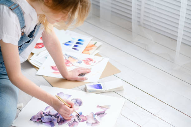 istock leisure art talent expression girl drawing picture 958630262