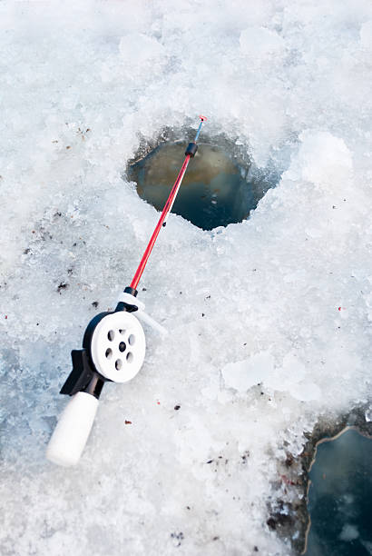 istock winter fishing 95863167