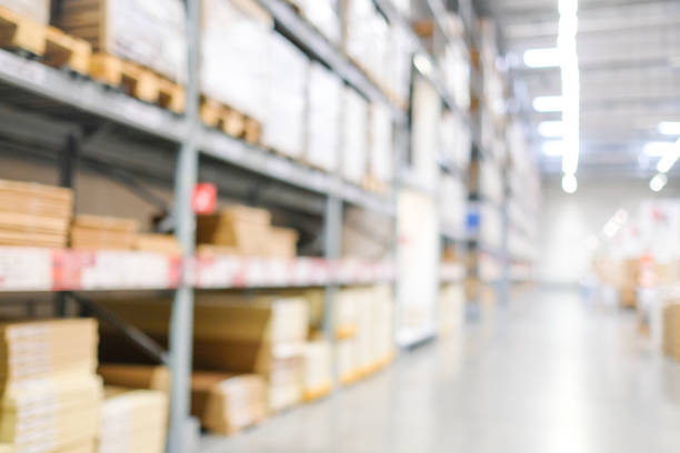 istock Blurred business background, Blur warehouse with bokeh light background 958634144