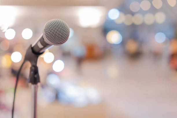 Close up microphone in conference hall stock photo