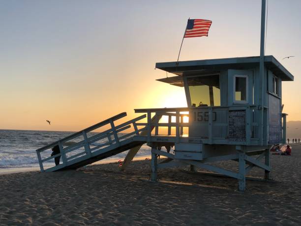 istock Lifeguard Tower at Santa Monica Beach at Sunset 958638236