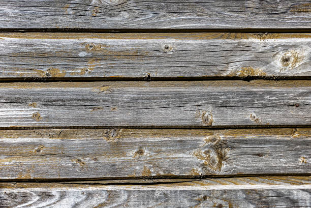 istock Old dirty wooden wall as background 958646962