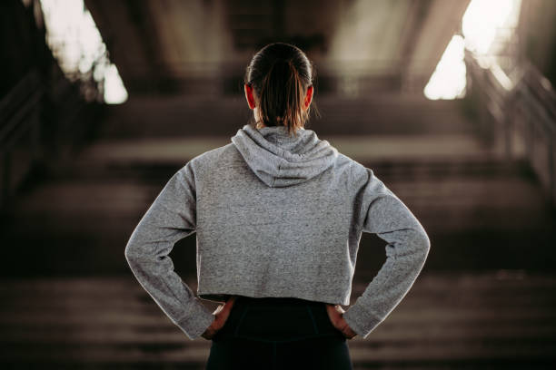 istock Woman standing by the steps 958648050