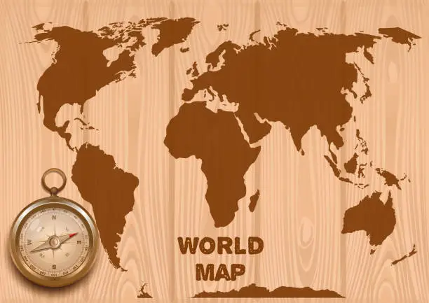 Vector illustration of World map and golden compass on a wood background