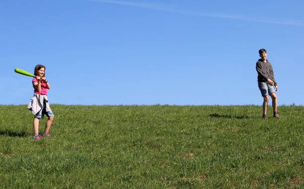 istock two children playing outdoor 958659898