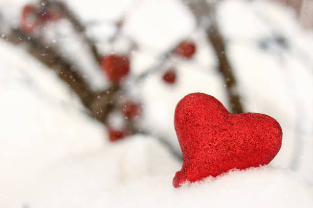 istock Red glitter heart in the snow 958662288