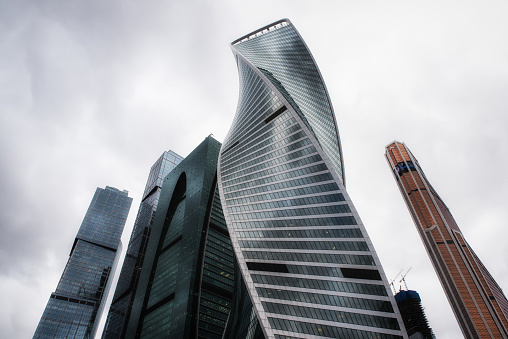 Moscow, Russia, 26th April 2018: International financial and business trading center Moscow City in Russian capital.Gigantic metal skyscrapers against a dramatic sky