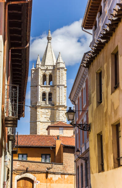 istock Cathedral tower between colorful houses in Leon, Spain 958667956