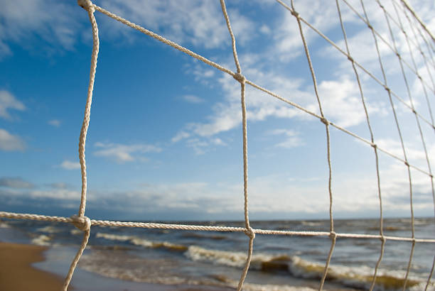 istock Sea coastline landscape through volleyball net 95866966