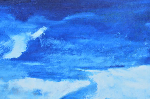 istock Painted with a blue watercolor paint canvas with white smears. 958672056