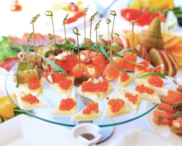 istock catering table set service with silverware and glass stemware at restaurant before party 958673714