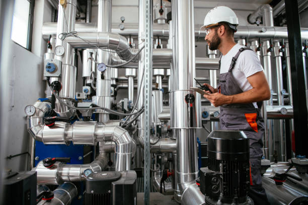 técnico de comprobación del sistema - boiler natural gas heat equipment fotografías e imágenes de stock