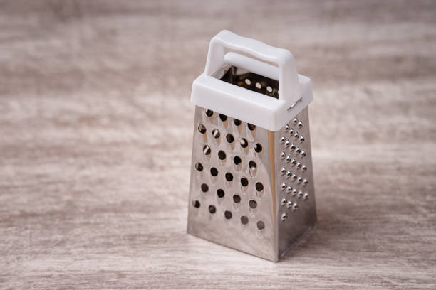 istock Grater on the wooden table 958677270