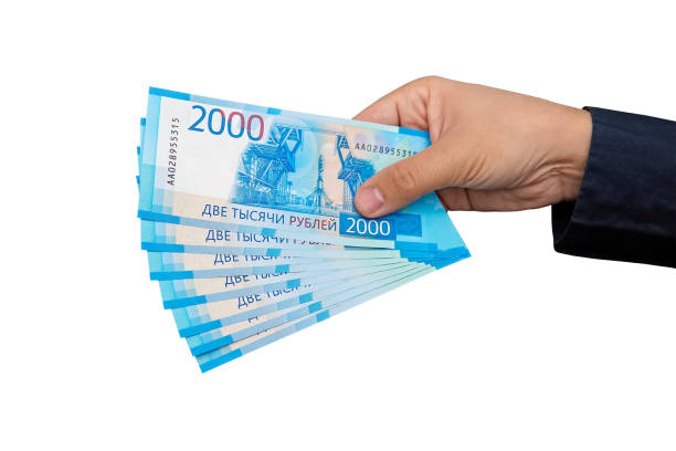 istock new Russian banknotes denominated in 2000 rubles in male hands 958677732