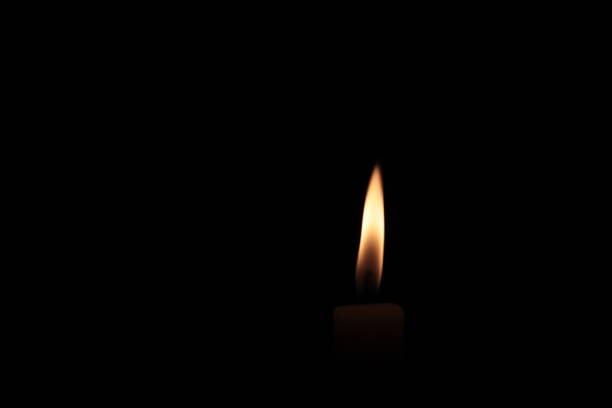 istock Candle Flame On A Black Background Photo Shot. 958678452