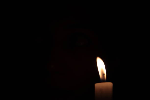 istock Candle Flame On A Black Background Photo Shot. 958678468