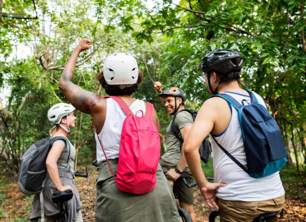istock Group of friends out bicycling together 958682364