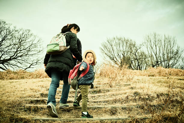 istock Brothers travel with his mother 958683464