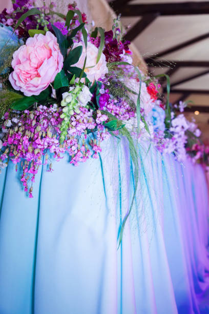 istock Banquet, tables, flowers, glasses, plates. 958693398