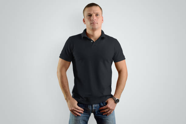 istock Mockup black  polo shirts.  Athletic man is isolated on a gray background. 958698452