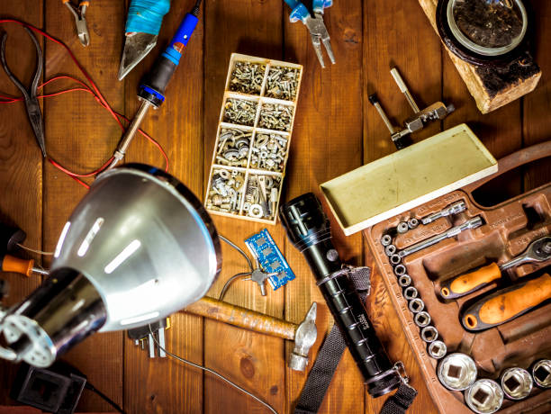 istock overhead top down view of table with instruments in workshop and lamp on top 958698654