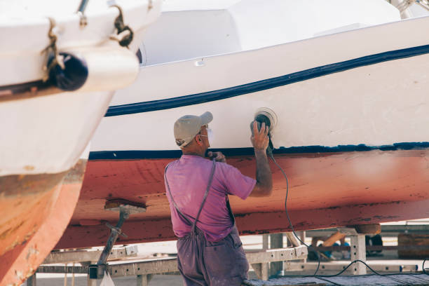 istock A man prepares a coloring boat. 958701324