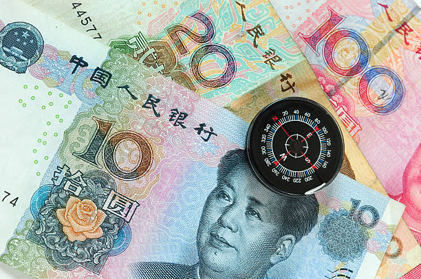 bússola em moedas. série. - 10 yuan note - fotografias e filmes do acervo