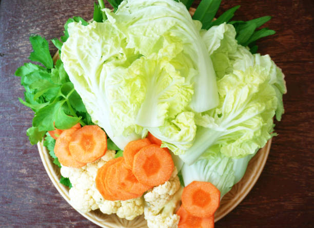 Vegetable set: green sweet basil ( Thai basil ), Celery (Smallage), morning glory, cauliflower, Chinese cabbages and orange carrots