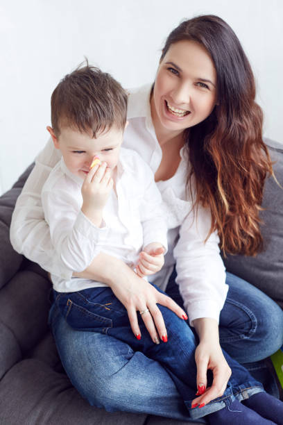 istock Happy smiling mother with son. 958709574