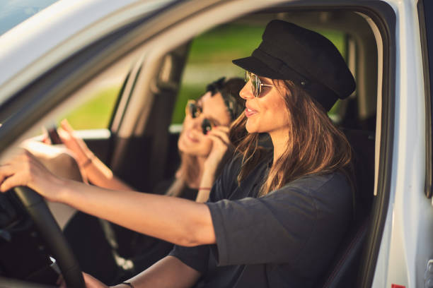 istock Two young women having fun on road trip 958710680