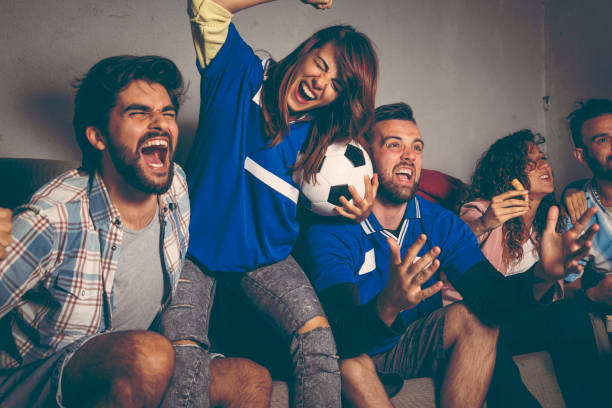 istock Celebrating team's victory after scoring a goal 958713284