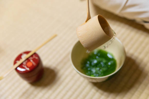 istock Pouring hot water into tea bowl 958723032