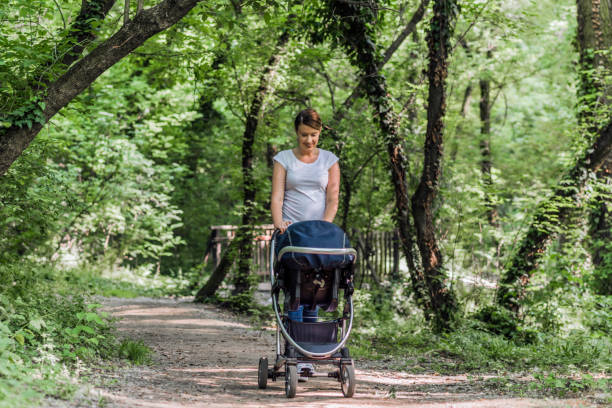 istock Mother and her son in the park 958724082