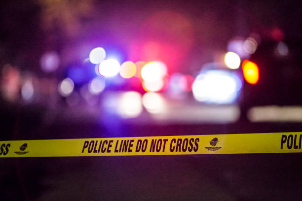 The scene of a Police shooting in Royal Oak, MI May 14th 2018 (2018-05-14 Royal Oak, MI) Police barrier on the scene of a shooting near the intersection of Hudson Ave and McLean Ave in Royal Oak just after 3:13am Monday May 14th 2018. crime scene stock pictures, royalty-free photos & images