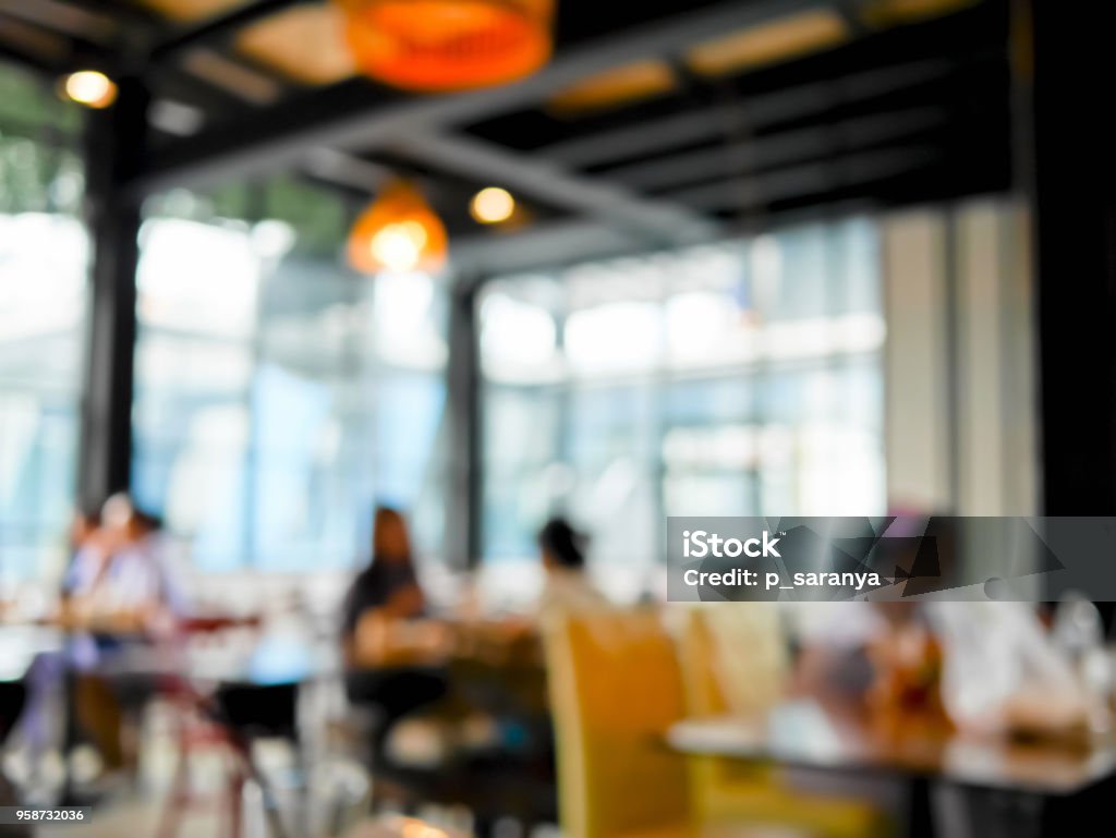 Blurred people dinning in the restaurant Defocused Stock Photo