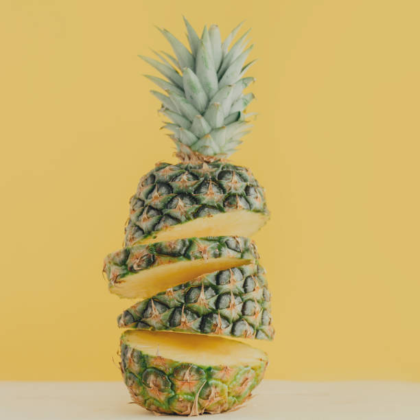 istock Colorful sliced pineapple on pink 958732220